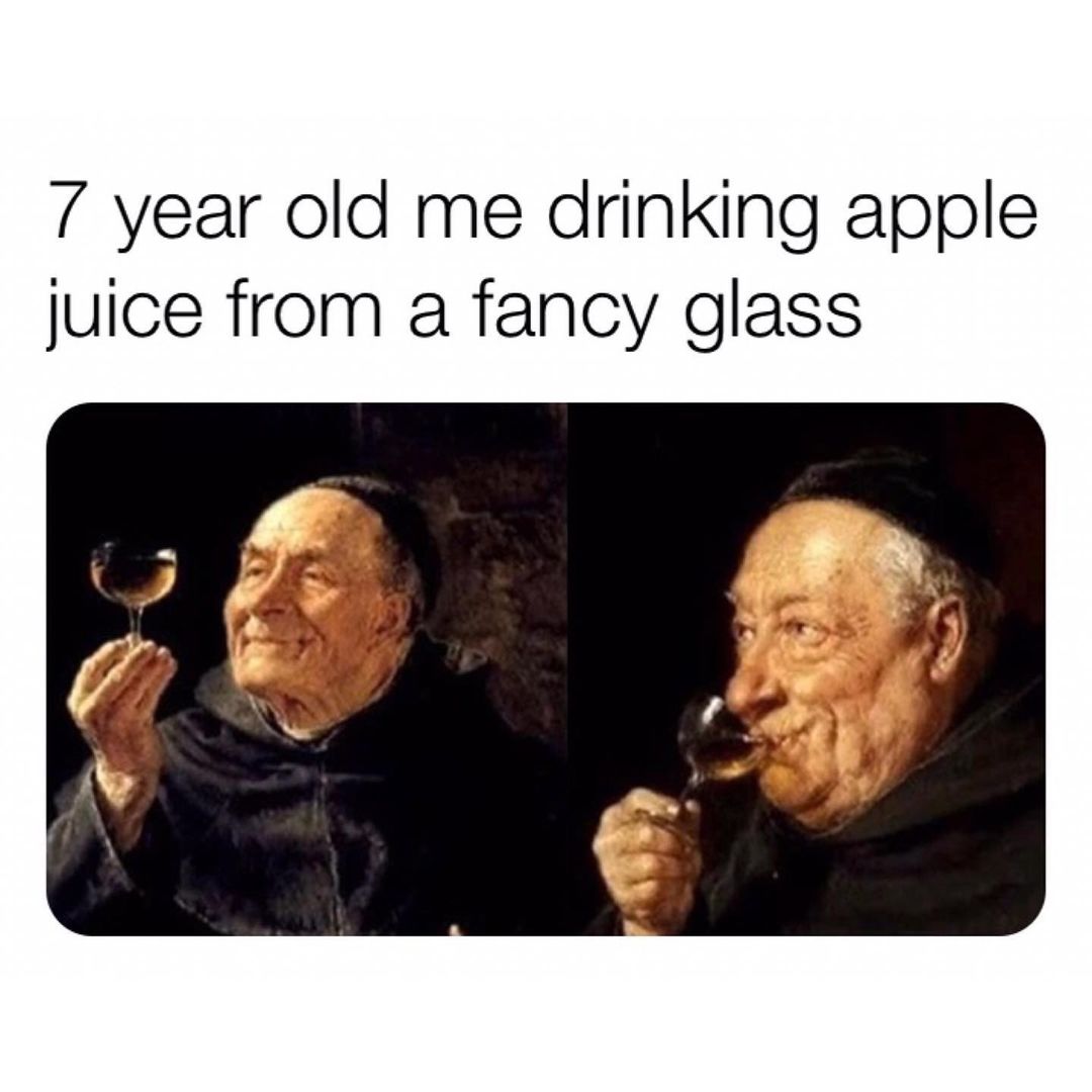 7 year old me drinking apple juice from a fancy glass.