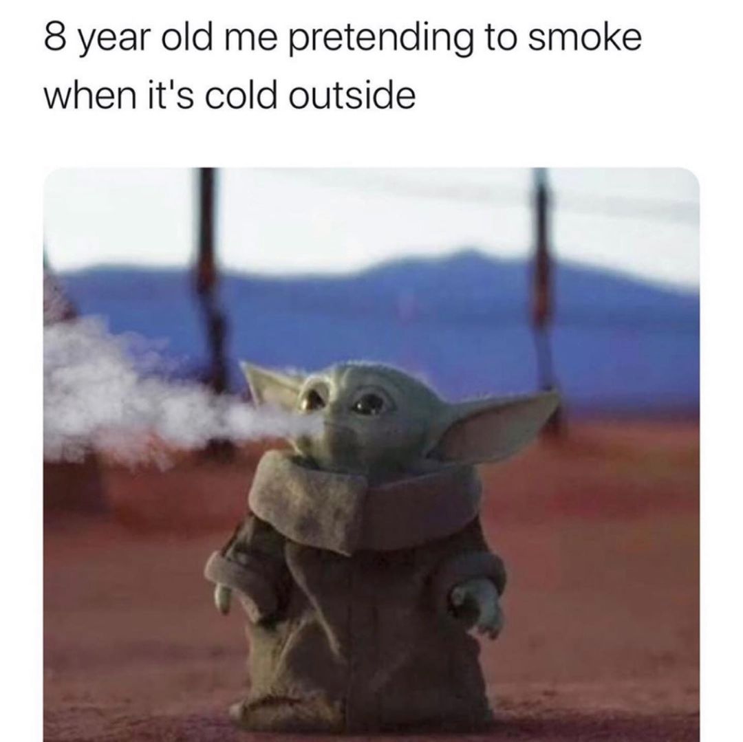 8 year old me pretending to smoke when it's cold outside.
