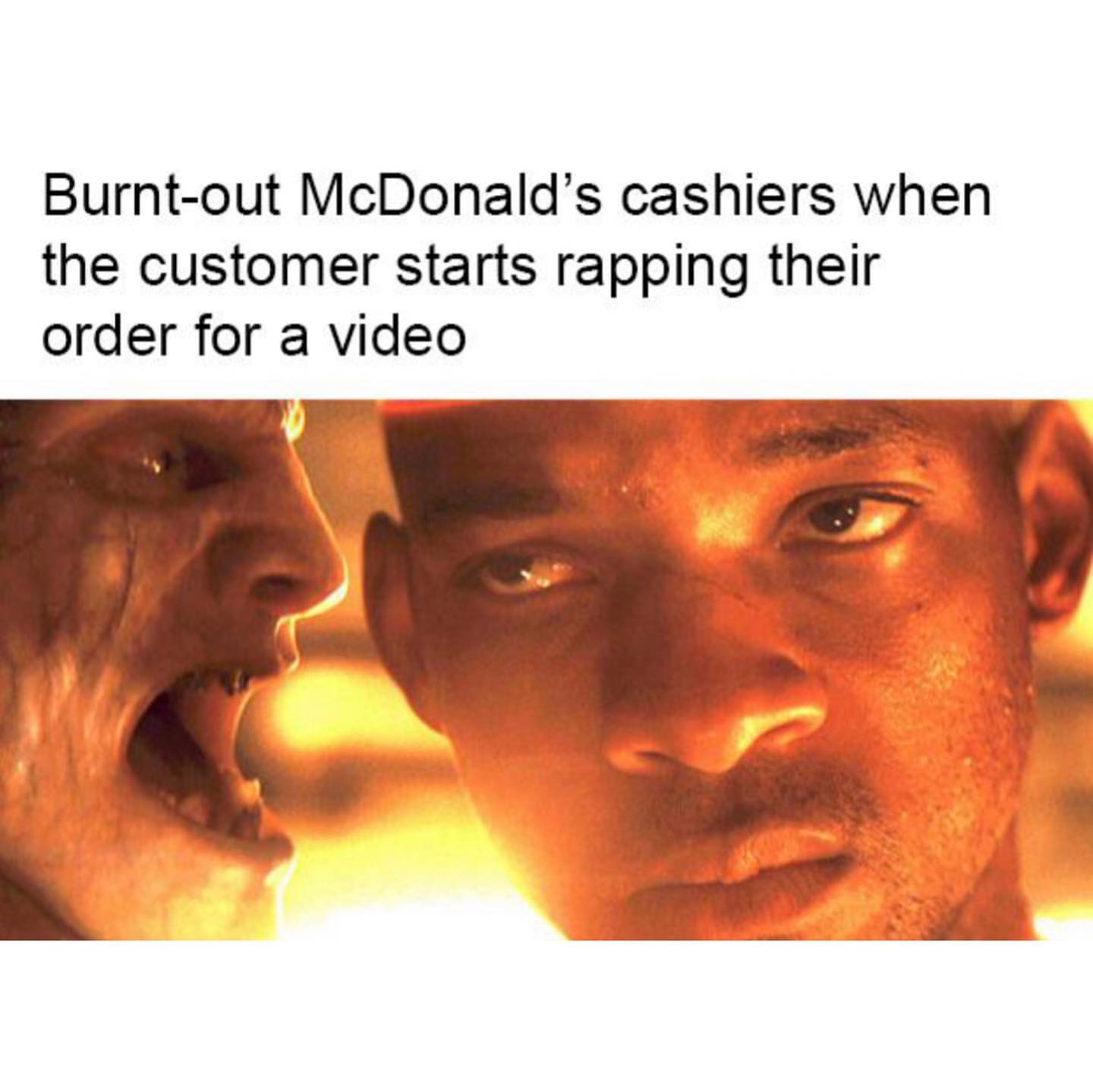 Burnt-out McDonald's cashiers when the customer starts rapping their order for a video.