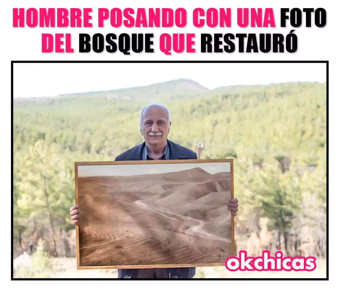 Hombre posando con una foto del bosque que restauró.