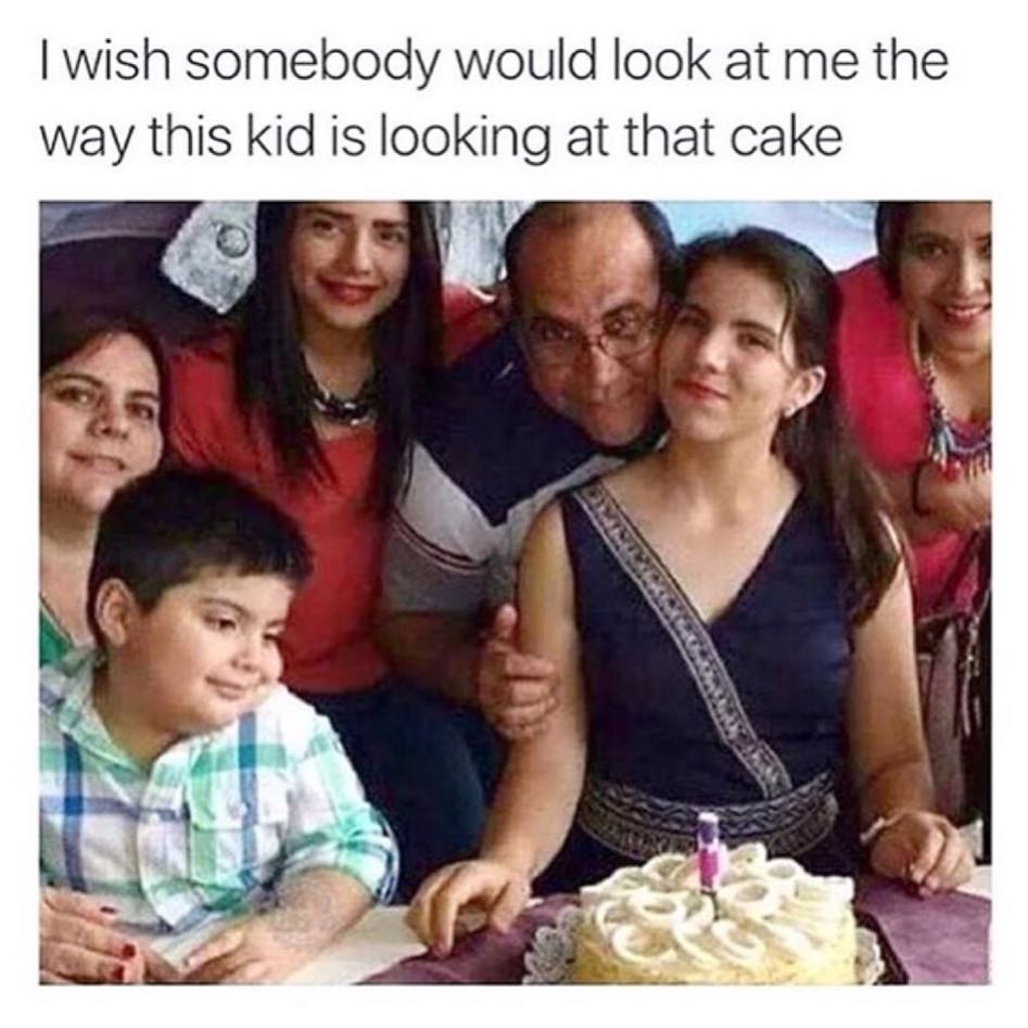 I wish somebody would look at me the way this kid is looking at that cake.