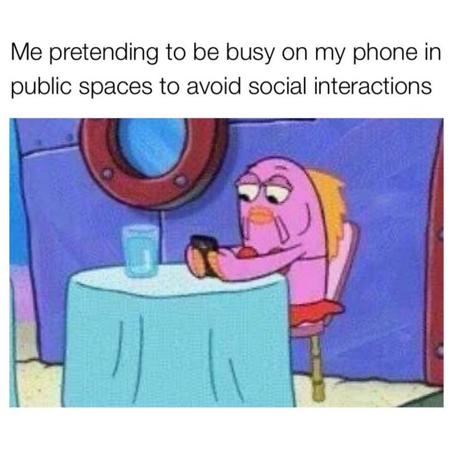 Me pretending to be busy on my phone in public spaces to avoid social interactions.
