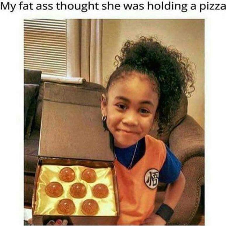 My fat ass thought she was holding a pizza.