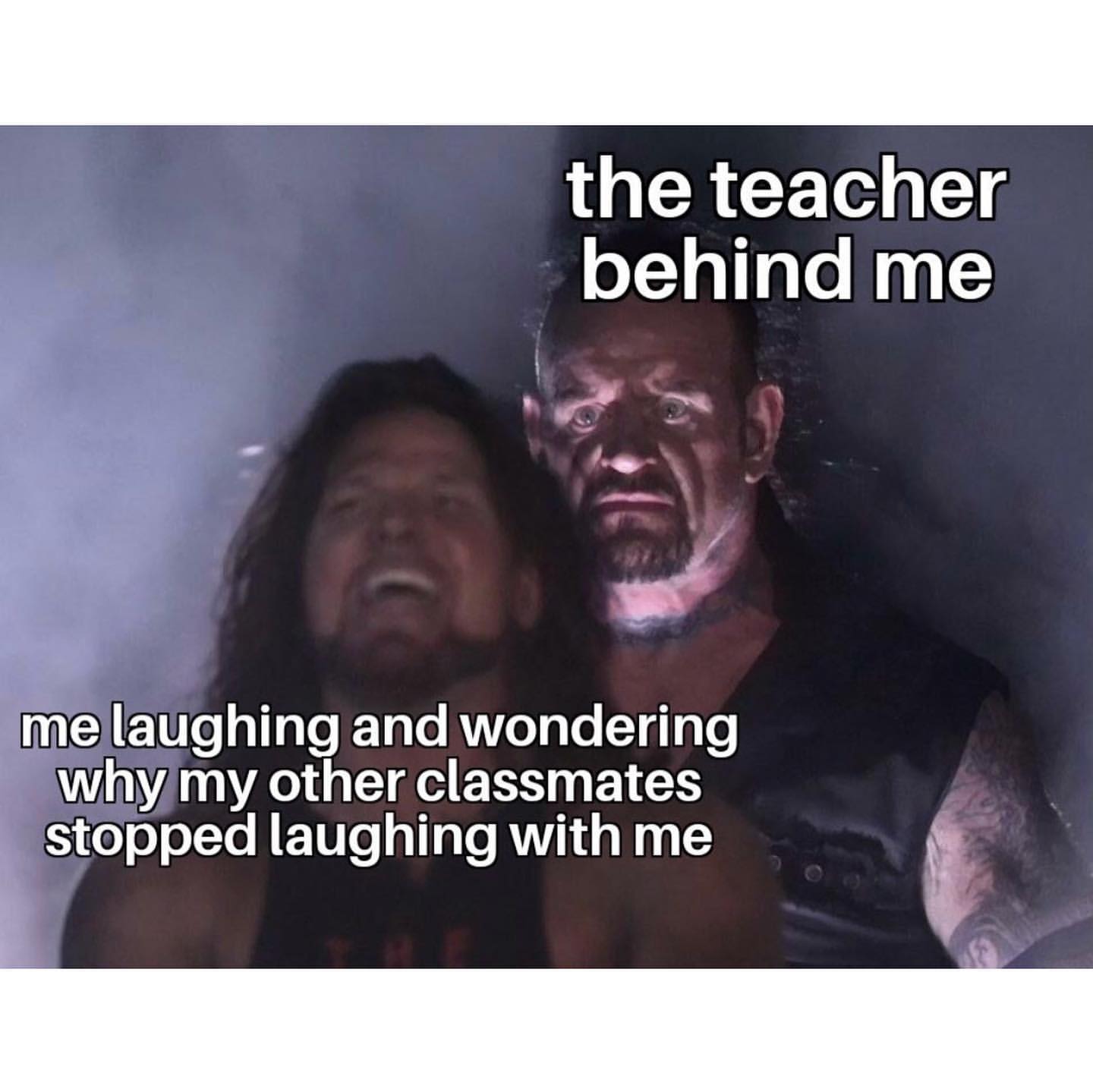 The teacher behind me.  Me laughing and wondering why my other classmates stopped laughing with me.